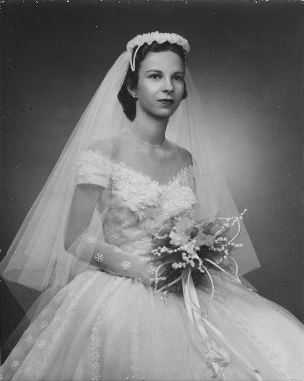 A person in a wedding dress
Description automatically generated